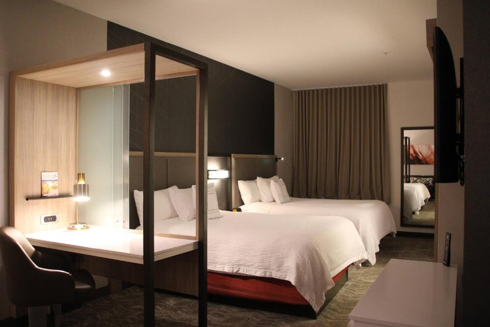 Queen Suite with Two Queen Beds, Bathtub and Trundle Sofa - Mobility Access interior